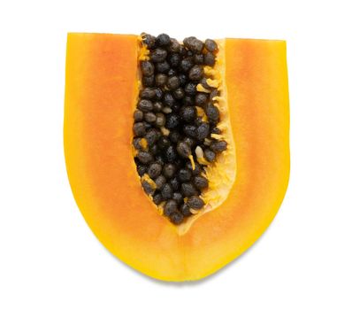 Ripe papaya sliced with seeds isolated on white background