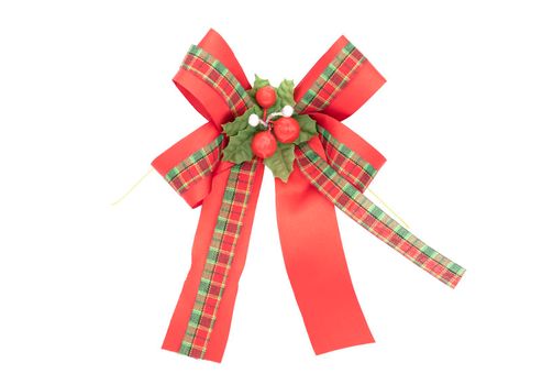 Red satin and green checkered ribbon with red ornament isolated on white background 