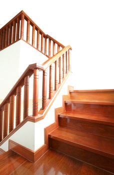 Wooden stairs and handrail isolated on white background