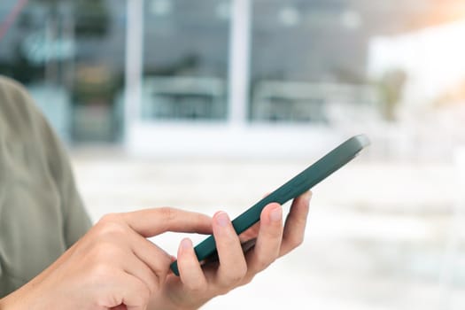 Woman hand using smartphone to do work business, social network, communication concept.