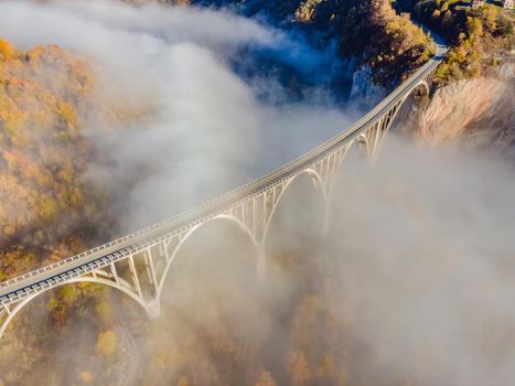 Montenegro. Dzhurdzhevich Bridge Over The River Tara foggy morning.