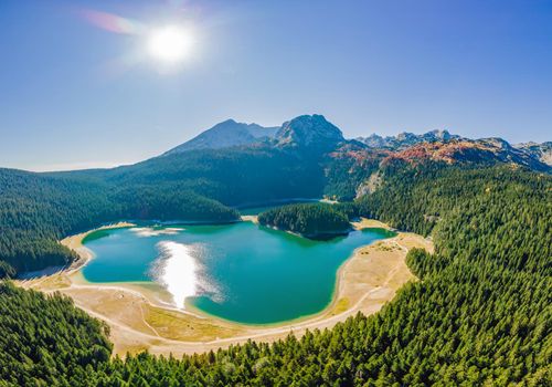 Aerial view on Black lake in National park Durmitor. Montenegro. Travel around Montenegro concept.