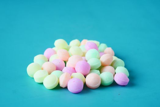 colorful Naphthalene ball on light green background