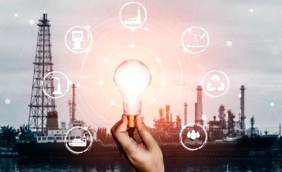 Green energy innovation light bulb with future industry of power generation icon graphic interface. Concept of sustainability development by alternative energy.