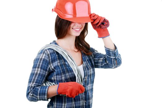 Young playful woman in shirt and jeans and orange helmet holding cabel