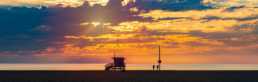 Lifeguard cabin at sunset ocean in Santa Monica, California, United States of America