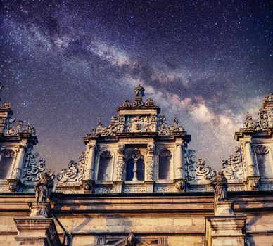 Architecture outside church. Night time starry sky. Retro stale