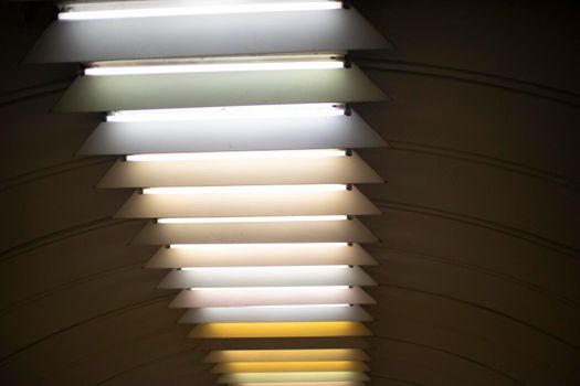 Light on ceiling. Fluorescent lamps. Interior details.