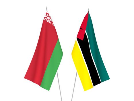 National fabric flags of Belarus and Republic of Mozambique isolated on white background. 3d rendering illustration.
