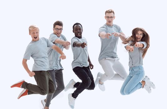 casual group of happy young people jumping isolated over a white background