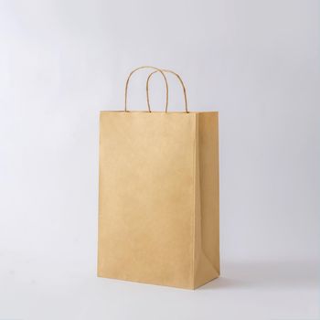 Cardboard brown paper bag for shop shopping and business mockup. Concept of minimal purchase sale and delivery.