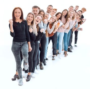 confident young woman standing in front of a column of young people . photo with copy-space