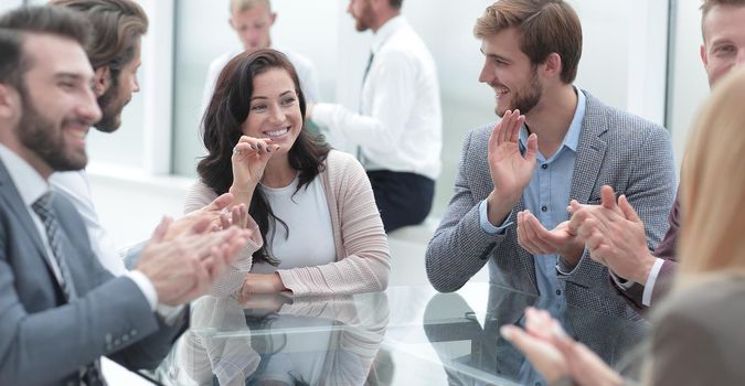 confident business woman explaining something to her business partners . business concept