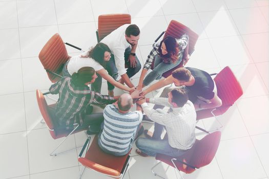 view from the top. business team shows its unity.isolated on white.