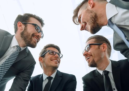 close up.a group of business people near the desktop.business concept