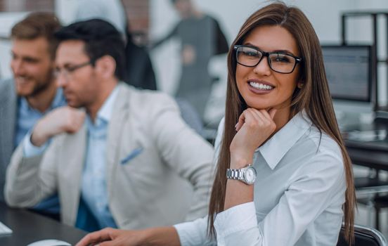 business woman sitting at the office Desk. photo with copy space