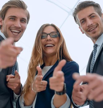 cheerful business people stand next to each other