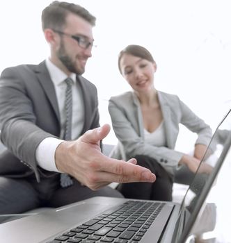 stylized photo. business colleagues working with laptop