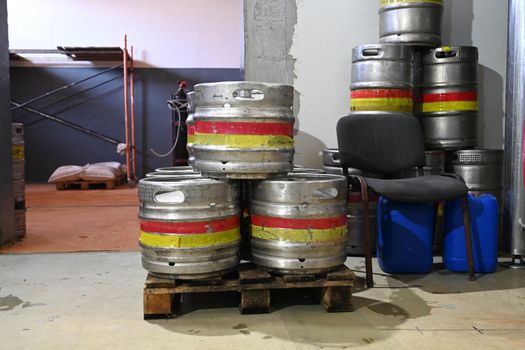 Photo of barrels with finished beer at the beer production