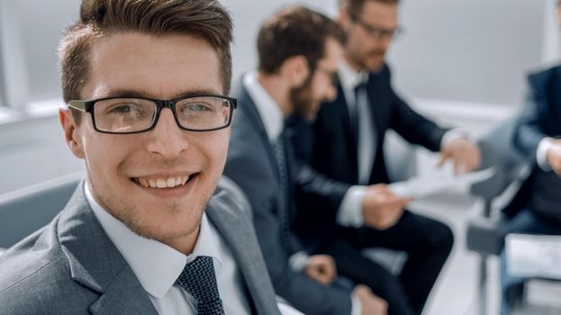 young businessman at a business meeting in the office .business concept
