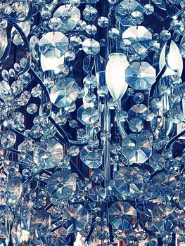 Crystal glass chandelier as abstract background, home decor lighting detail and luxury interior design concept