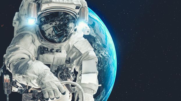 Astronaut spaceman do spacewalk while working for spaceflight mission at space station . Astronaut wear full spacesuit for operation . Elements of this image furnished by NASA space astronaut photos .