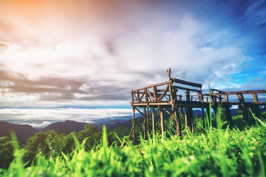 Mountain natural balcony in Doi Ang Khang, Thailand. Green grass and beautiful sky.