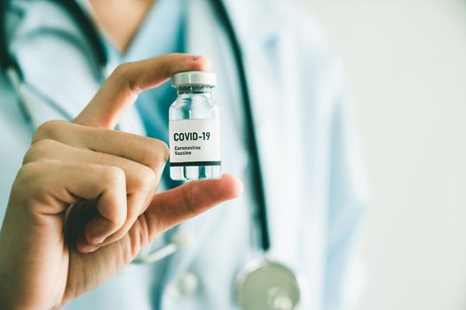 Skillful doctor prepare vaccine proficiently before injection . Covid 19 and coronavirus vaccination center service concept .