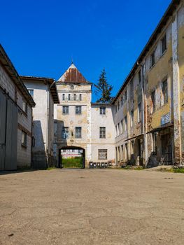 Urban exploration of square with few old buildings