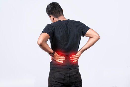 People with spine problems, man with back problems on isolated background, lumbar problems concept, a sore man with back pain