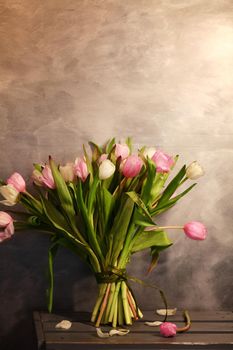 Flowers white and pink on the grey background.