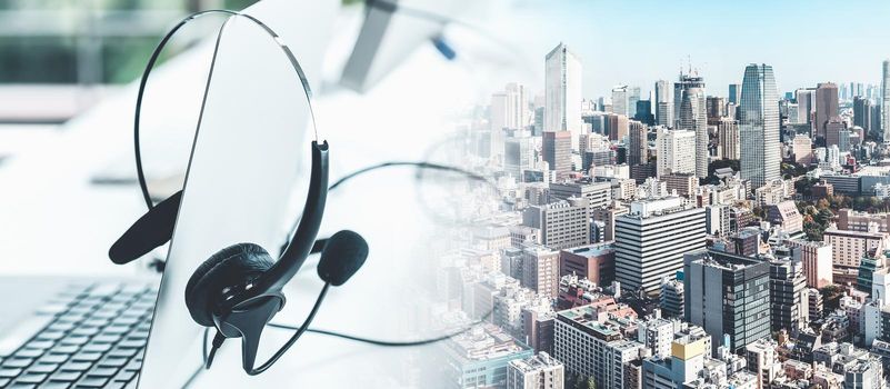 Headset and customer support equipment at call center ready for actively service . Corporate business help desk and telephone assistance concept .