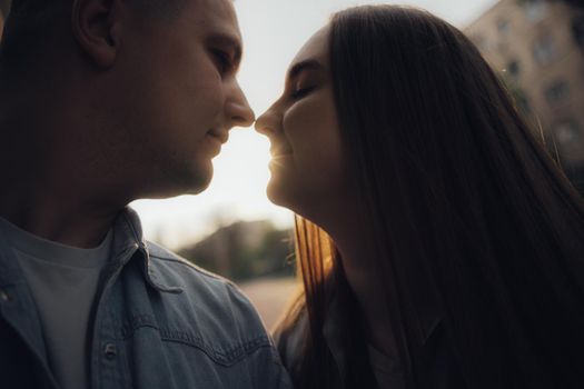 loving couple walking in ukrainian park and city