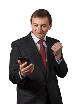 Confident mature businessman receive good news on the sell phone, having happy look, smiling on white isolated background