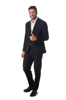 Full length portrait of a friendly businessman with thumb up isolated on white background
