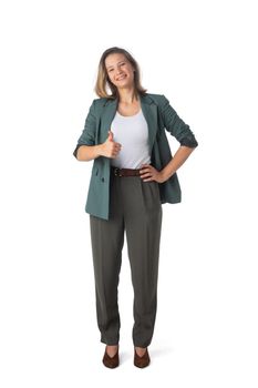 Full length portrait of a friendly business woman with thumb up isolated on white background