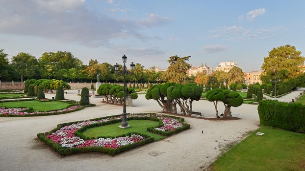 Trees, flowers and plants in the Parterre garden in the Retiro Park, Madrid, Spain.