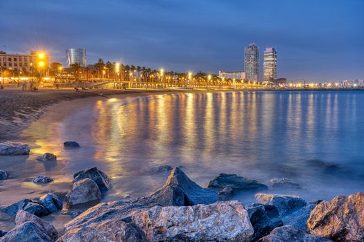 The beach of Barcelona in Spain at night