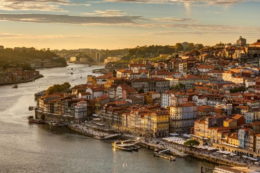 The old town of Porto with the river Douro during the last rays of the sun