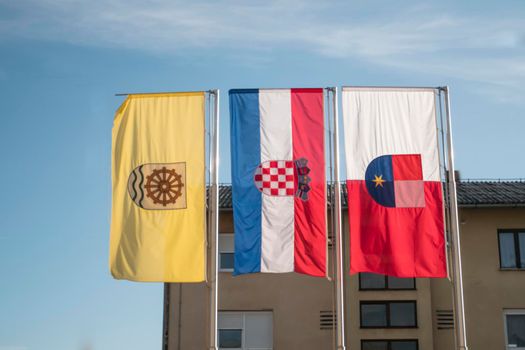 Flags on the mast in the town of Podturen. The flags are from the city of Podturen, the Croatian state and the county of Medimurje. World wetlands day, WWD 2020.