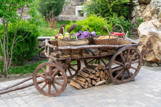 an old village cart with pumpkins on a beautiful background. High quality photo