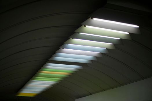 Light on ceiling. Fluorescent lamps. Interior details.