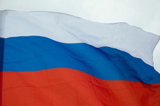 Flag of Russia. Symbol of Russian Federation. Combination of white blue and red. Fabric in colors of state.