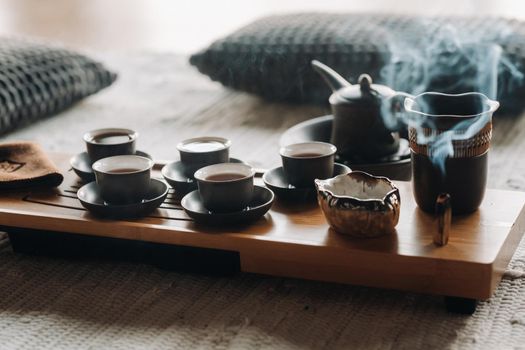 Preparing for a tea ceremony with a large company.