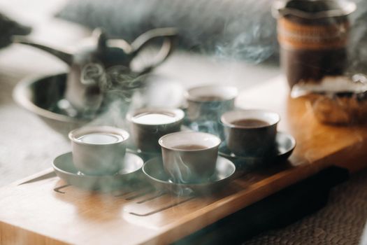 Preparing for a tea ceremony with a large company.