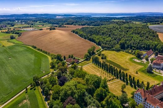 Aerial  view from drone of beautiful fresh green cultivated fields in Germany