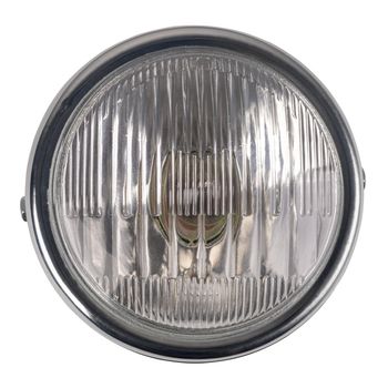 Close-up motorcycle headlight isolated in a white background.