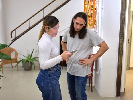 woman talks to her colleague about her work project, horizontal background