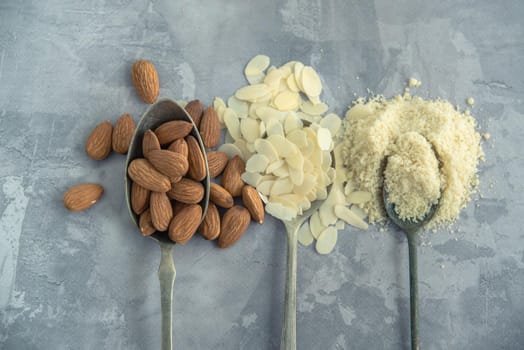 almonds, flakes and flour made from it. top view. High quality photo