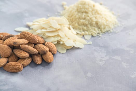 almonds, flakes and flour made from it. top view. High quality photo